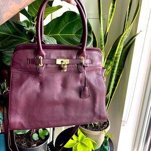 Danier purple leather purse with 3 handle types.